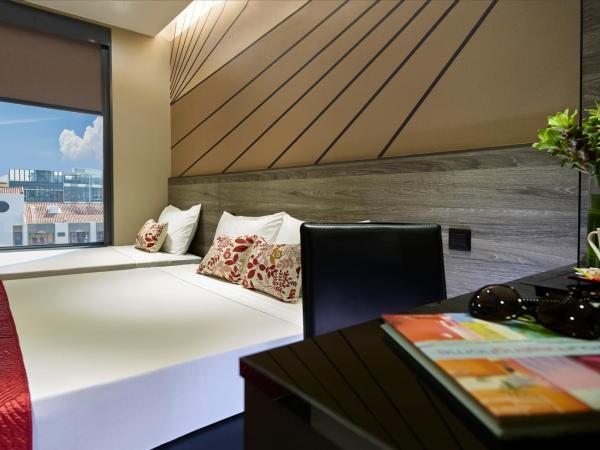 Hotel 81 Orchid : photo 2 de la chambre chambre triple
