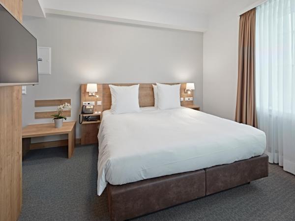 City Hotel : photo 4 de la chambre suite junior