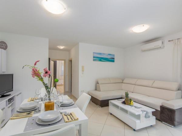 Silver Holiday House : photo 9 de la chambre appartement - vue sur jardin