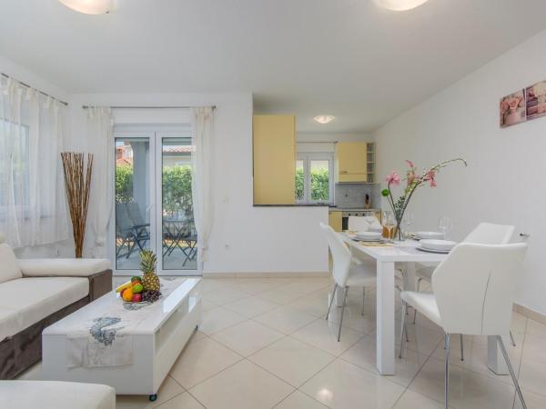 Silver Holiday House : photo 5 de la chambre appartement - vue sur jardin