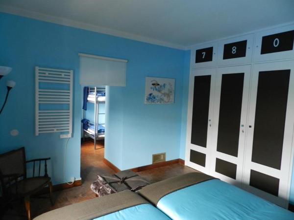 Peniche Blue Wave Home : photo 3 de la chambre chambre familiale - vue sur jardin