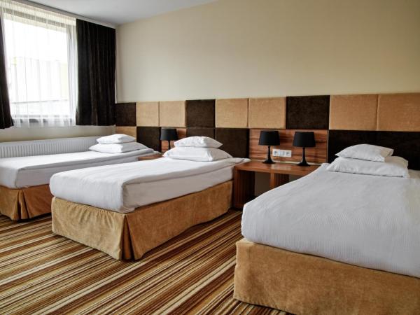 Boutique Hotel's : photo 2 de la chambre chambre triple standard