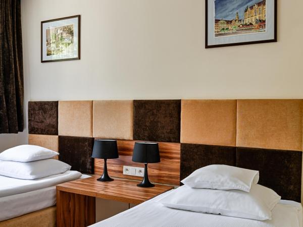 Boutique Hotel's : photo 8 de la chambre chambre lits jumeaux