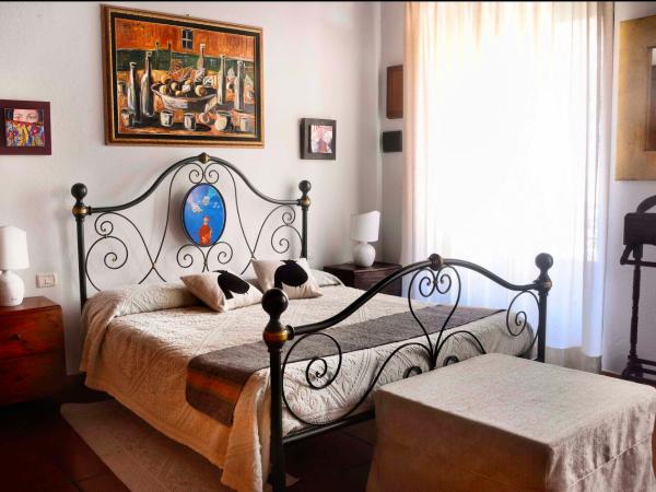 Relais del Porto - Affitta Camere : photo 1 de la chambre chambre lit king-size avec baignoire spa