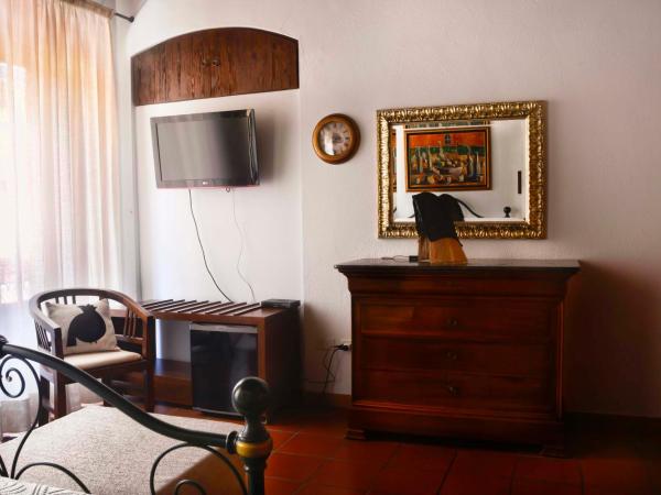 Relais del Porto - Affitta Camere : photo 2 de la chambre chambre lit king-size avec baignoire spa