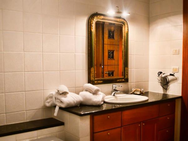 Relais del Porto - Affitta Camere : photo 4 de la chambre chambre lit king-size avec baignoire spa