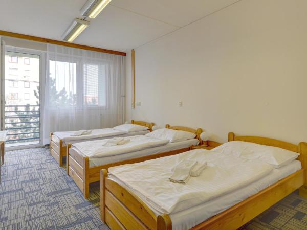 Volha : photo 1 de la chambre chambre triple avec salle de bains commune