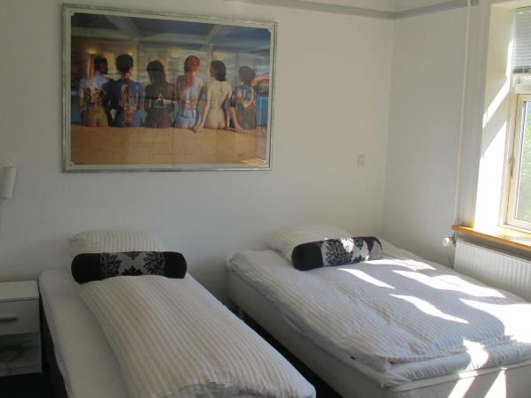 Guesthouse Sharon Aarhus : photo 6 de la chambre chambre double ou lits jumeaux avec salle de bains commune