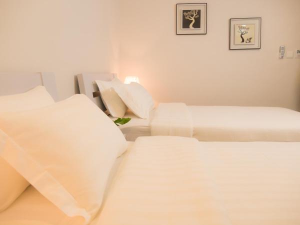 The Kinn Bangkok : photo 2 de la chambre chambre lits jumeaux deluxe