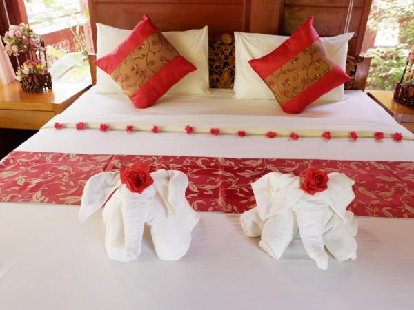 Phi Phi Maiyada Resort- SHA Certified : photo 9 de la chambre bungalow avec lit double