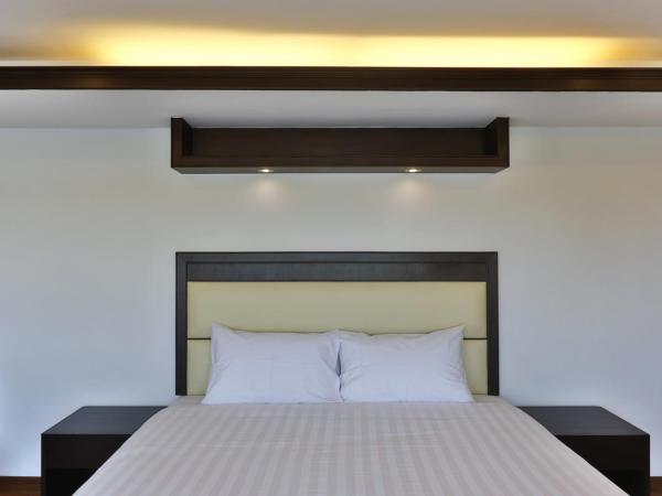 Initial Hua Hin - SHA Plus : photo 5 de la chambre chambre lit king-size deluxe