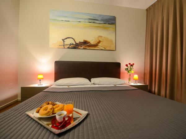 Residence Nazionale Matera : photo 6 de la chambre suite lit king-size