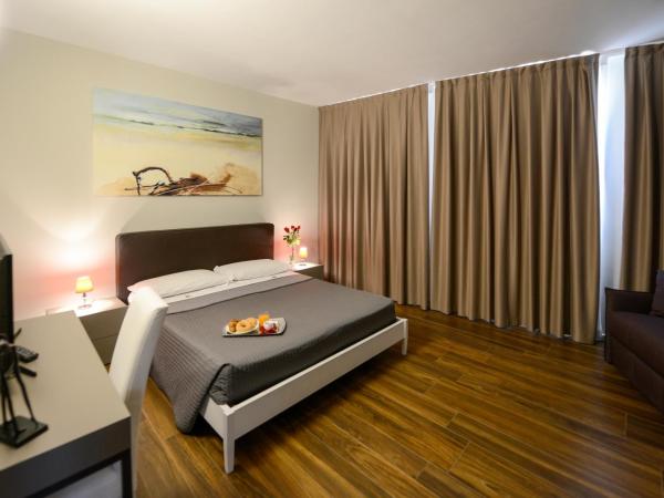 Residence Nazionale Matera : photo 5 de la chambre suite lit king-size