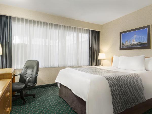Travelodge by Wyndham Winnipeg East : photo 4 de la chambre chambre lit queen-size deluxe - non-fumeurs