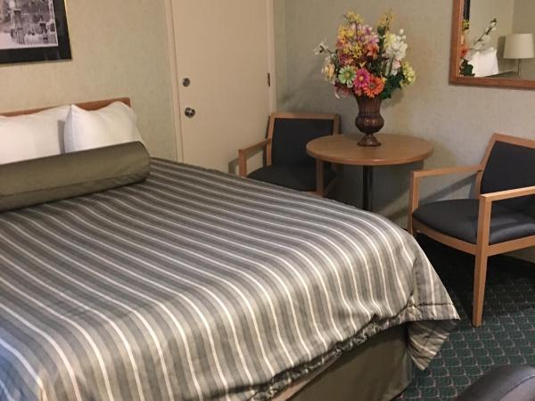 Travelodge by Wyndham Winnipeg East : photo 2 de la chambre chambre lit queen-size - non-fumeurs