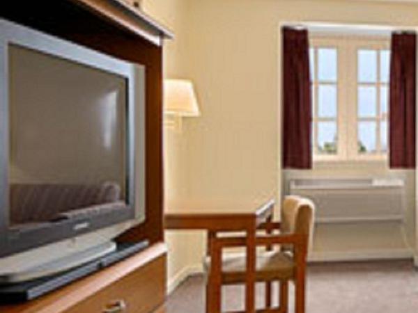 Super 8 by Wyndham New Orleans : photo 1 de la chambre chambre lit king-size - non-fumeurs