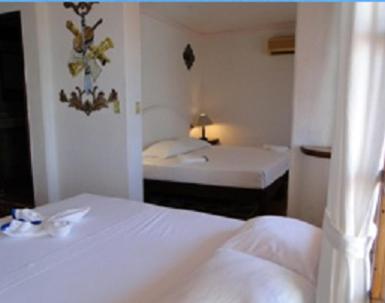 Hotel Paraiso Escondido : photo 4 de la chambre suite familiale