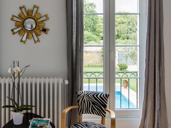 L'esprit du 8 : photo 3 de la chambre chambre lit king-size avec baignoire spa