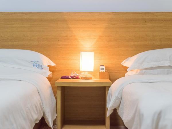 Sanya Passion fruit Inn : photo 3 de la chambre offre limitée - chambre lits jumeaux avec salle de bains privative