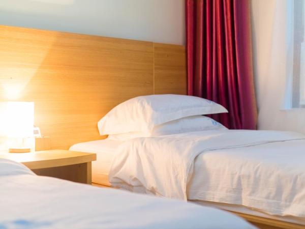 Sanya Passion fruit Inn : photo 2 de la chambre offre limitée - chambre lits jumeaux avec salle de bains privative