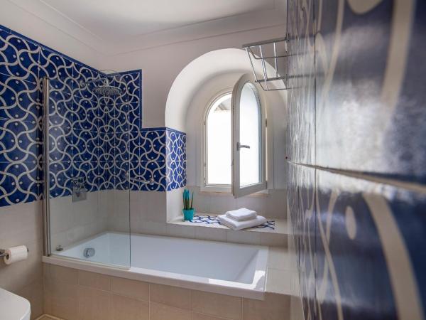 Villa Patrizi : photo 7 de la chambre chambre double deluxe avec baignoire