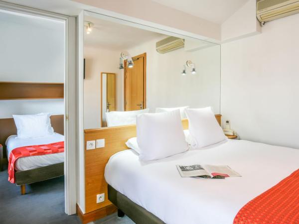 Logis Hotel & Restaurant Bergeret Sport : photo 1 de la chambre chambre triple