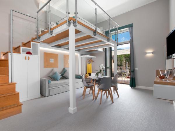 La Piazzetta Guest House : photo 1 de la chambre appartement supérieur en duplex avec terrasse