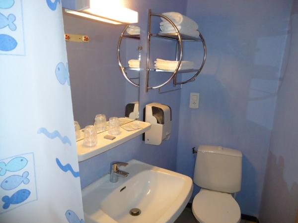 Hotel des Voyageurs : photo 4 de la chambre chambre quadruple