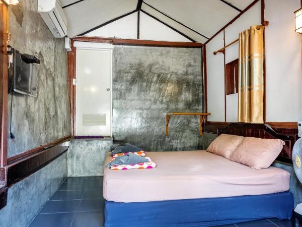 Tuk Tuk Guesthouse : photo 8 de la chambre bungalow avec climatisation