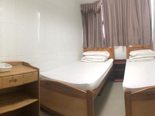 Hung Fai Guest House : photo 2 de la chambre chambre lits jumeaux