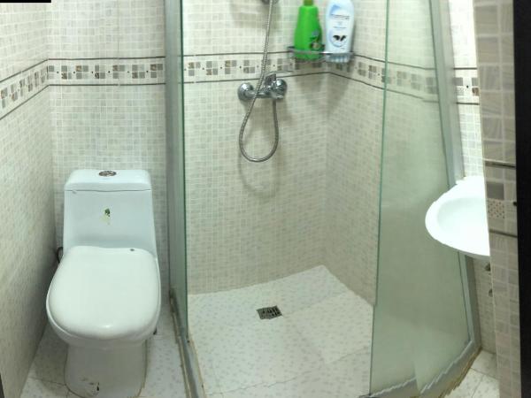 Hung Fai Guest House : photo 4 de la chambre chambre lits jumeaux