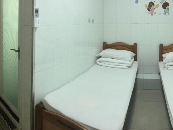 Hung Fai Guest House : photo 5 de la chambre chambre lits jumeaux