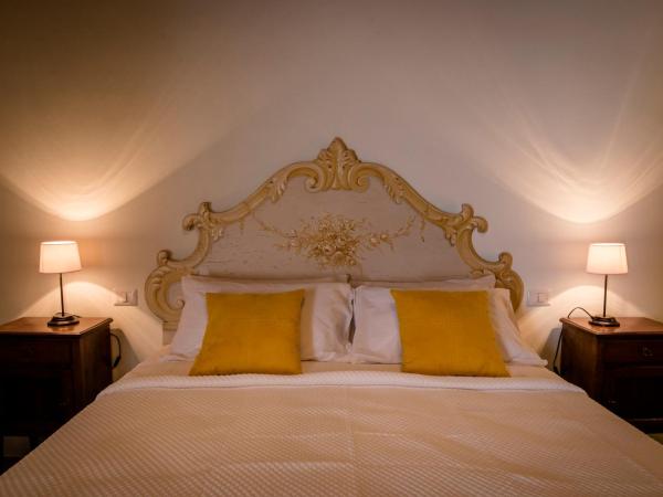 BnB Paolina : photo 10 de la chambre chambre lit king-size - vue sur jardin