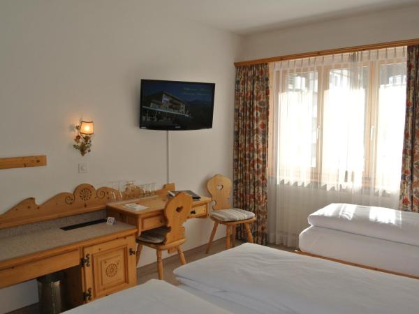 Hotel Corvatsch : photo 2 de la chambre chambre triple