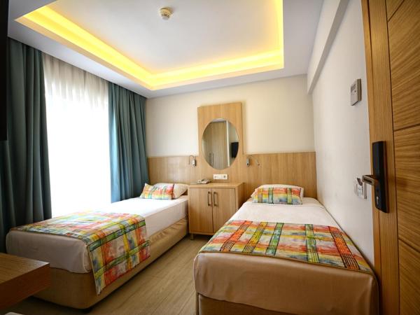 City Hotel Marmaris : photo 2 de la chambre chambre lits jumeaux standard