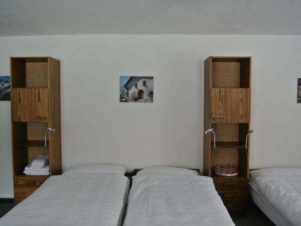 Hostel Casa Franco : photo 3 de la chambre chambre quadruple avec salle de bains commune