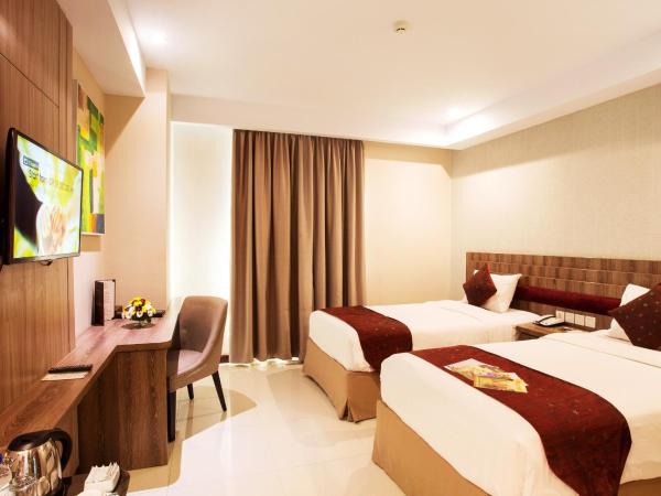 Tara Hotel Yogyakarta : photo 2 de la chambre chambre lits jumeaux deluxe