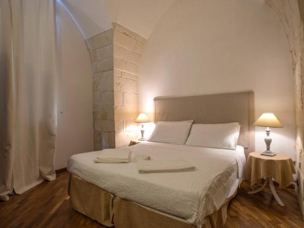 Chiesa Greca - SIT Rooms & Apartments : photo 2 de la chambre suite lit king-size avec terrasse