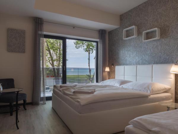 Trend Deluxe Siófok : photo 3 de la chambre chambre triple de luxe avec vue sur lac