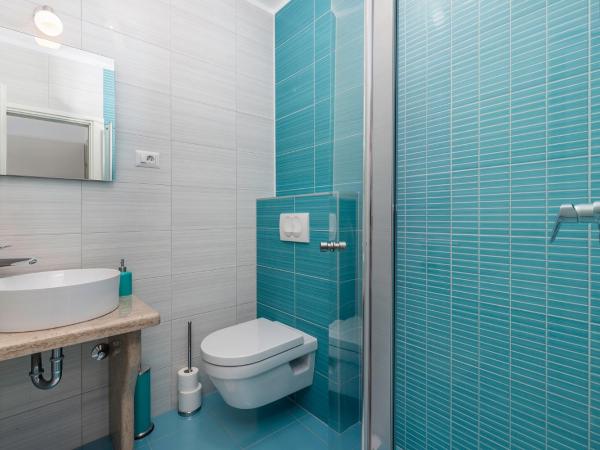 Guest House Ravnić : photo 7 de la chambre appartement 2 chambres avec patio