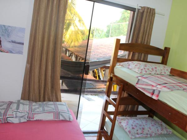 Rio Surf House Hostel e Pousada : photo 8 de la chambre chambre double avec salle de bains commune