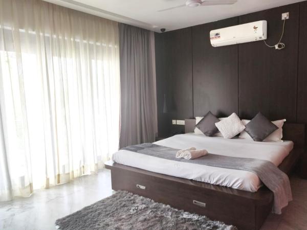 Tatvam Residency : photo 1 de la chambre chambre lit king-size