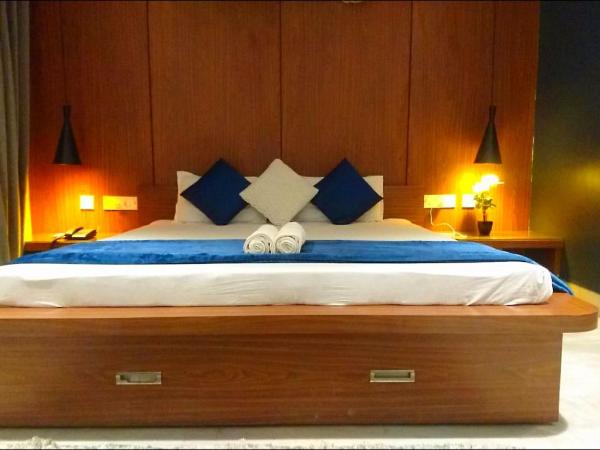 Tatvam Residency : photo 4 de la chambre chambre lit king-size
