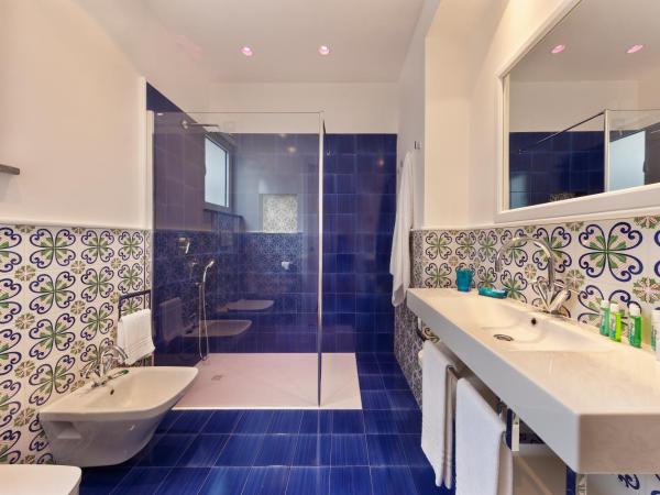 La Casa dell'Orologio - MAIN SQUARE : photo 2 de la chambre chambre quadruple classique