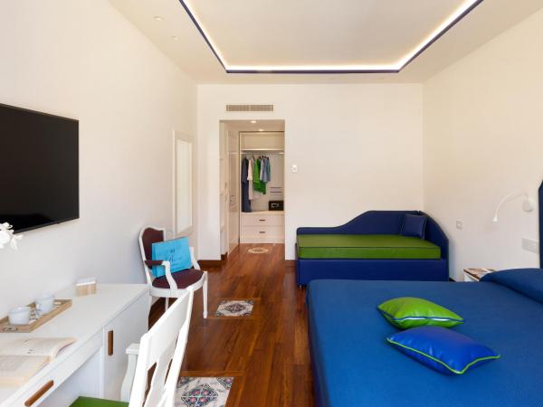 La Casa dell'Orologio - MAIN SQUARE : photo 4 de la chambre chambre quadruple classique