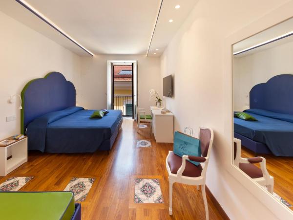 La Casa dell'Orologio - MAIN SQUARE : photo 8 de la chambre chambre quadruple classique