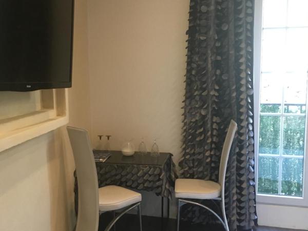 Les Suites de Naevag : photo 1 de la chambre chambre familiale avec baignoire