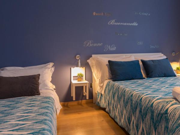 B&B Miro Centro Catania : photo 3 de la chambre chambre quadruple avec salle de bains privative séparée