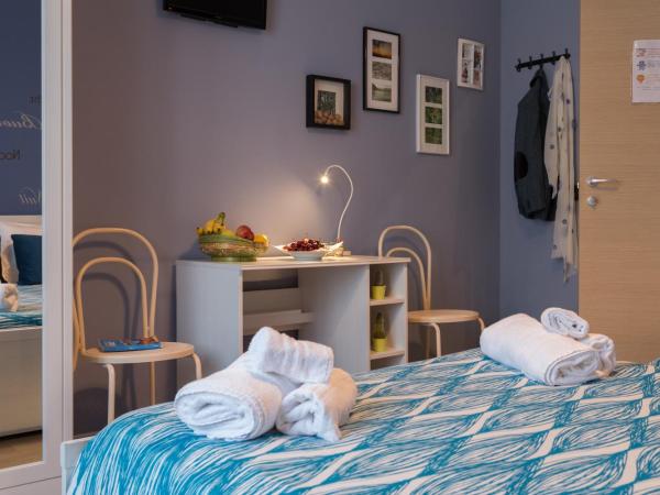 B&B Miro Centro Catania : photo 2 de la chambre chambre quadruple avec salle de bains privative séparée