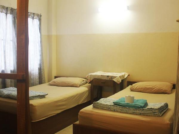 Sarah Guest House : photo 1 de la chambre chambre lits jumeaux avec salle de bains privative